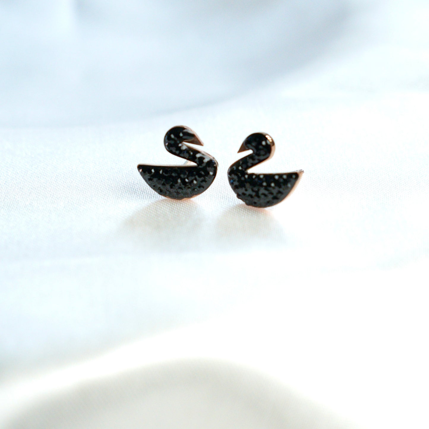 Swan studs