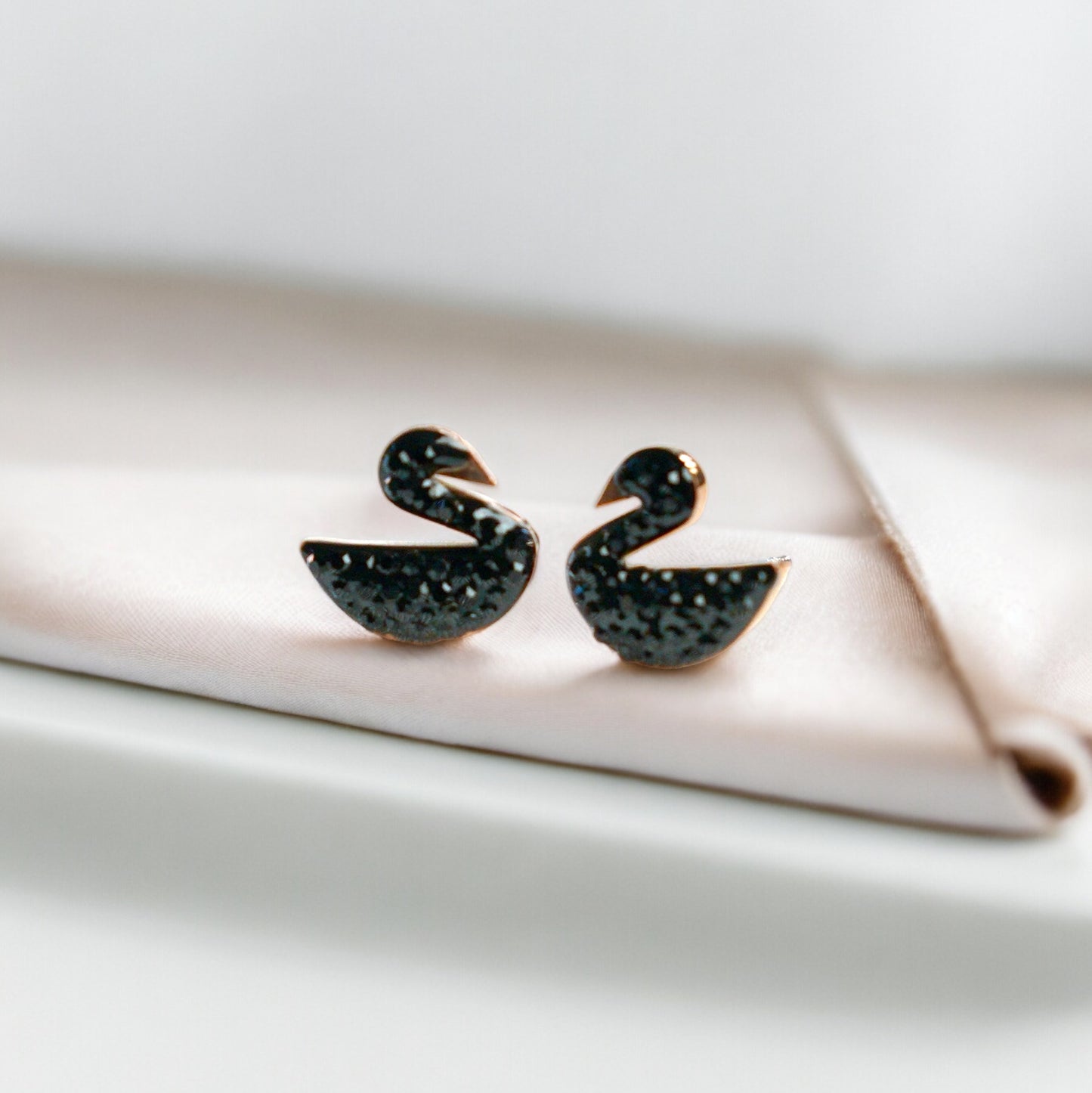 Swan studs